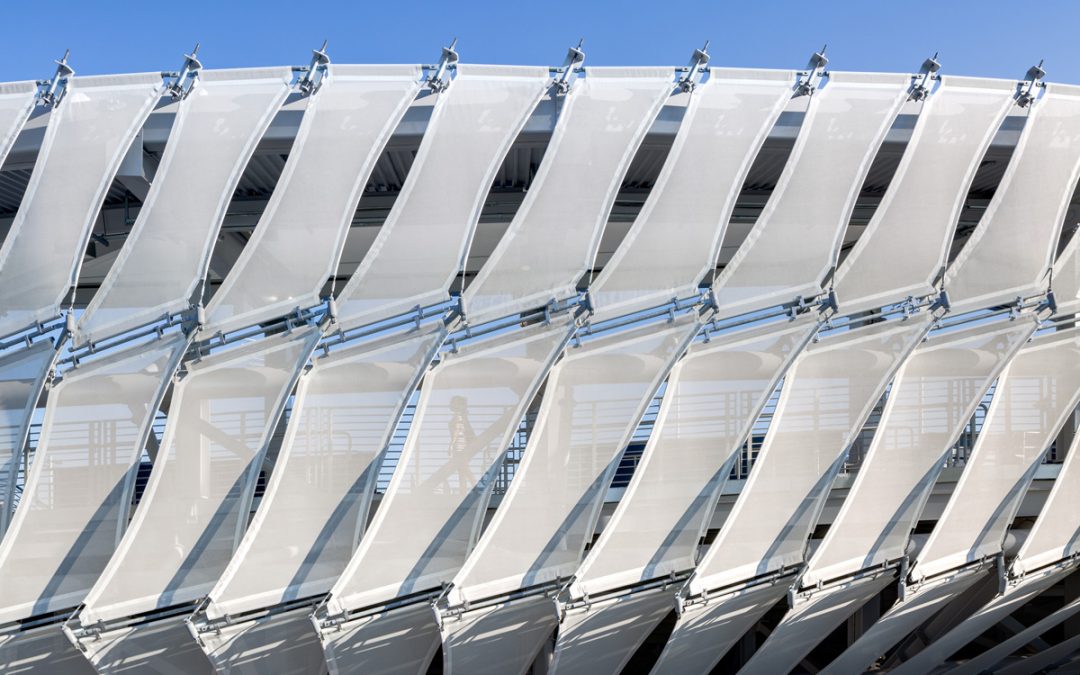 Fabric screen connects tennis stadium to surrounding park