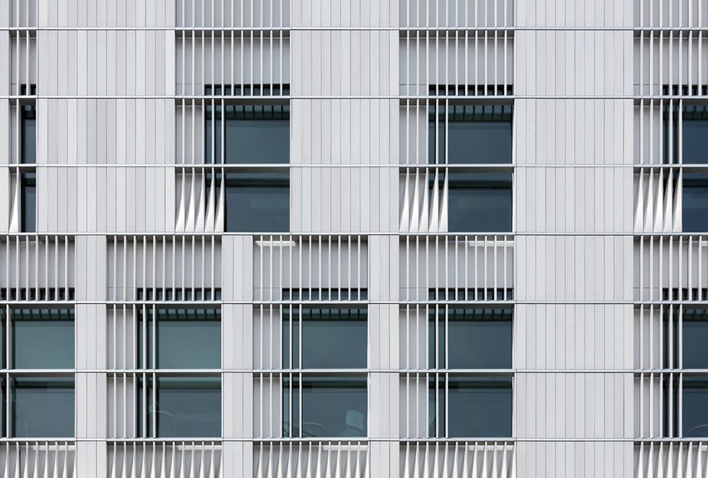 Shingled glass and twisting terra cotta accentuate new music building in Iowa City
