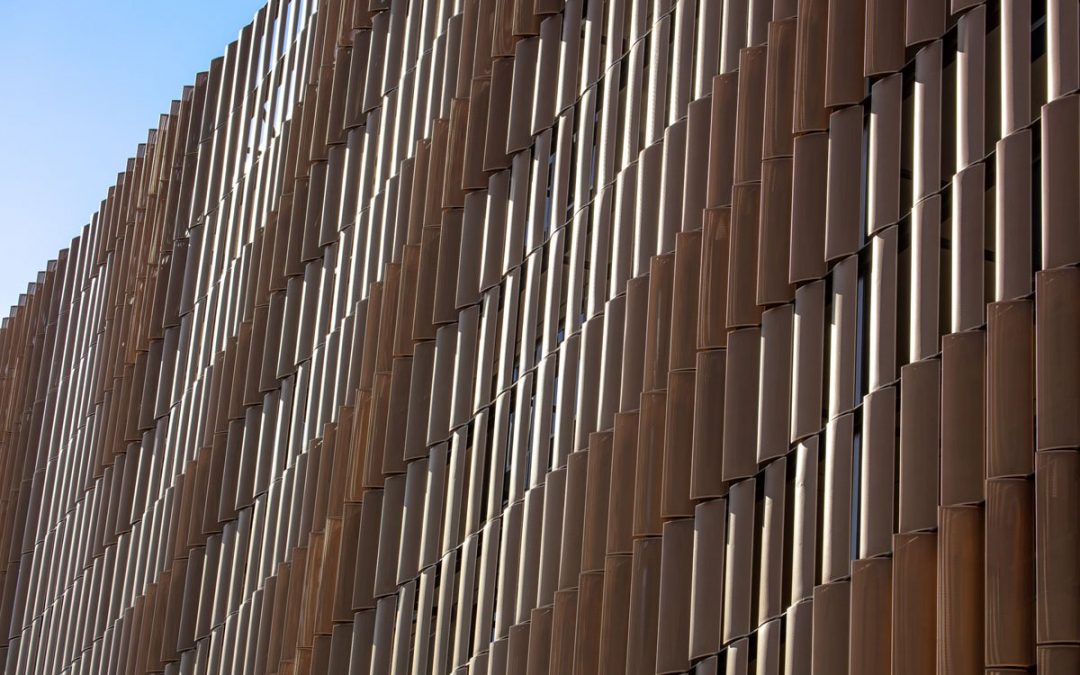 At Arizona State University, pixelated aluminum louvers shade residence hall