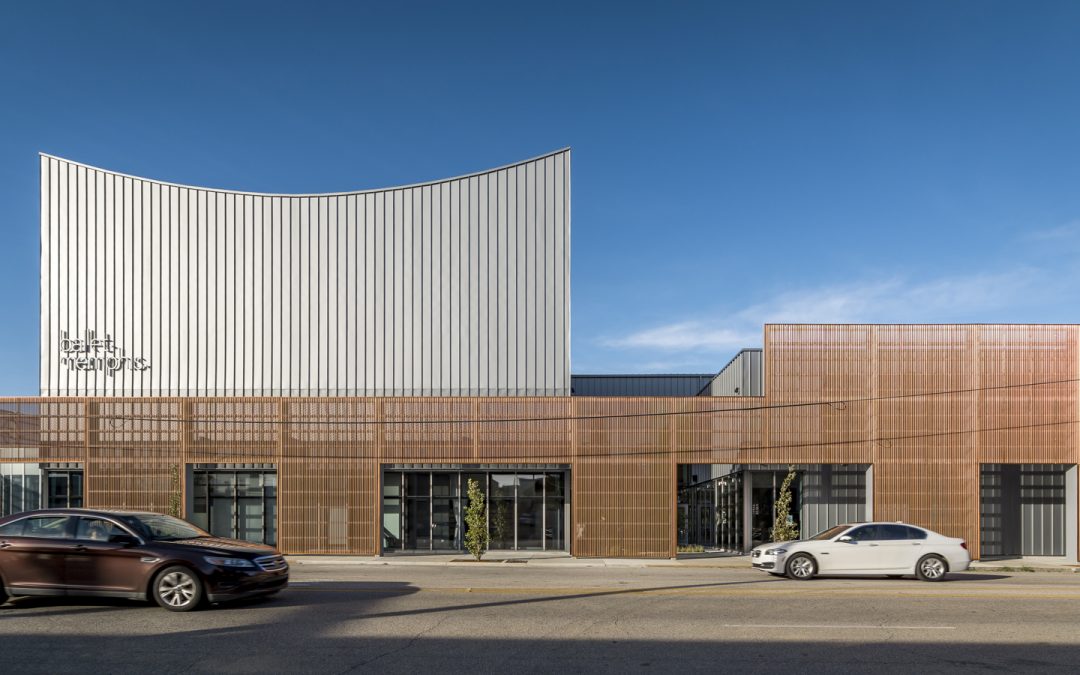 The Ballet Memphis building shines behind a corrugated copper curtain