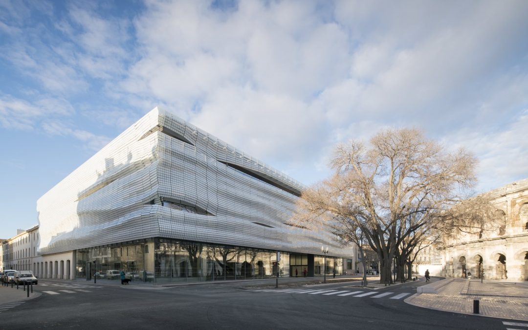 A French museum creates romance with a flowing glass tile facade