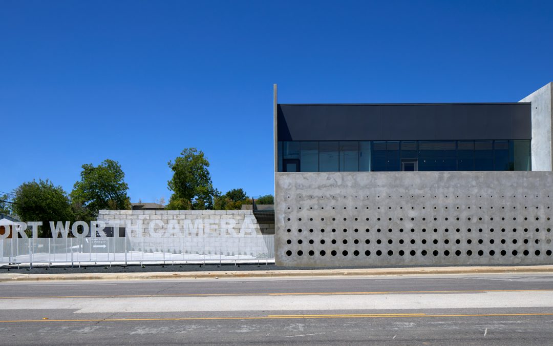 This concrete screen wall was inspired by the proportions of camera lenses