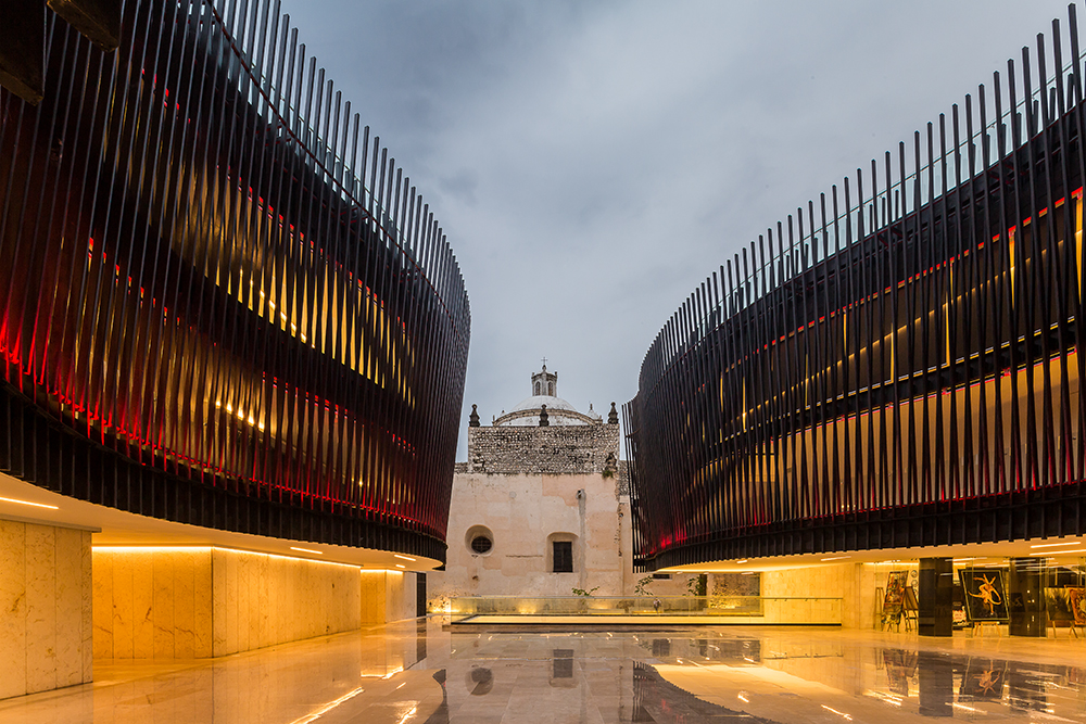 The Palace for Mexican Music sings with local stone and dramatic steel ribs