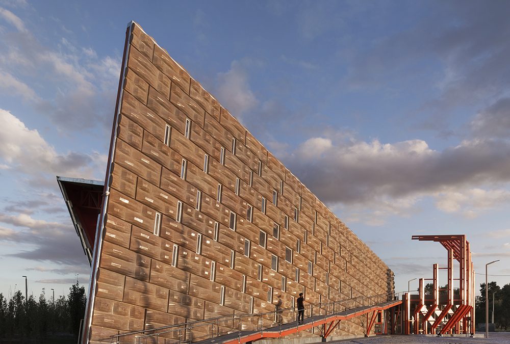 This memorial to Argentinian farmers glows with reinforced resin and burlap panels