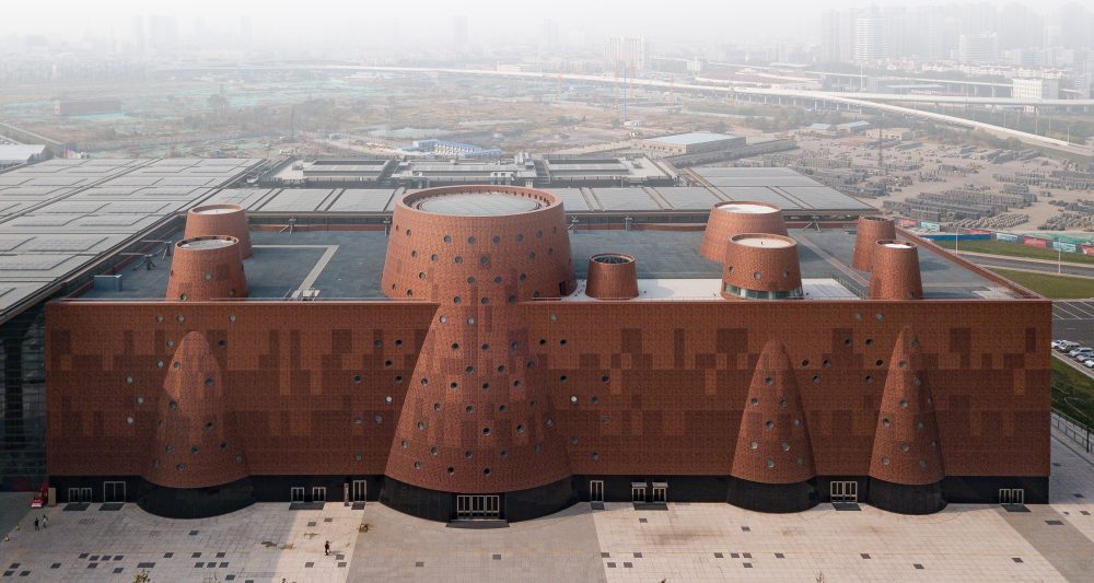 Bernard Tschumi Architects’ Exploratorium Museum bulges with cones of perforated aluminum panels