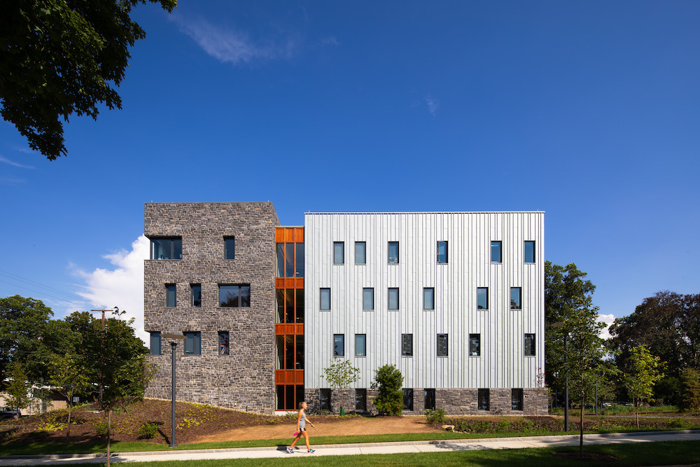 Deborah Berke Partners splits this dormitory with a zinc-and-stone facade